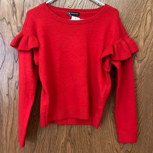 Cute ruffle sweater !